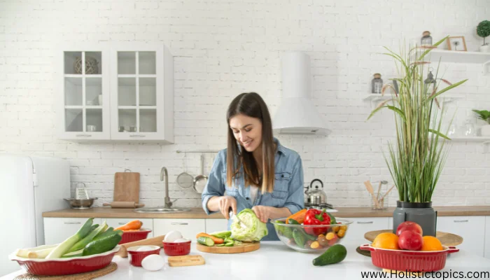 Woman preparing fresh vegetables in a clean kitchen, showing healthy kitchen tips for better nutrition